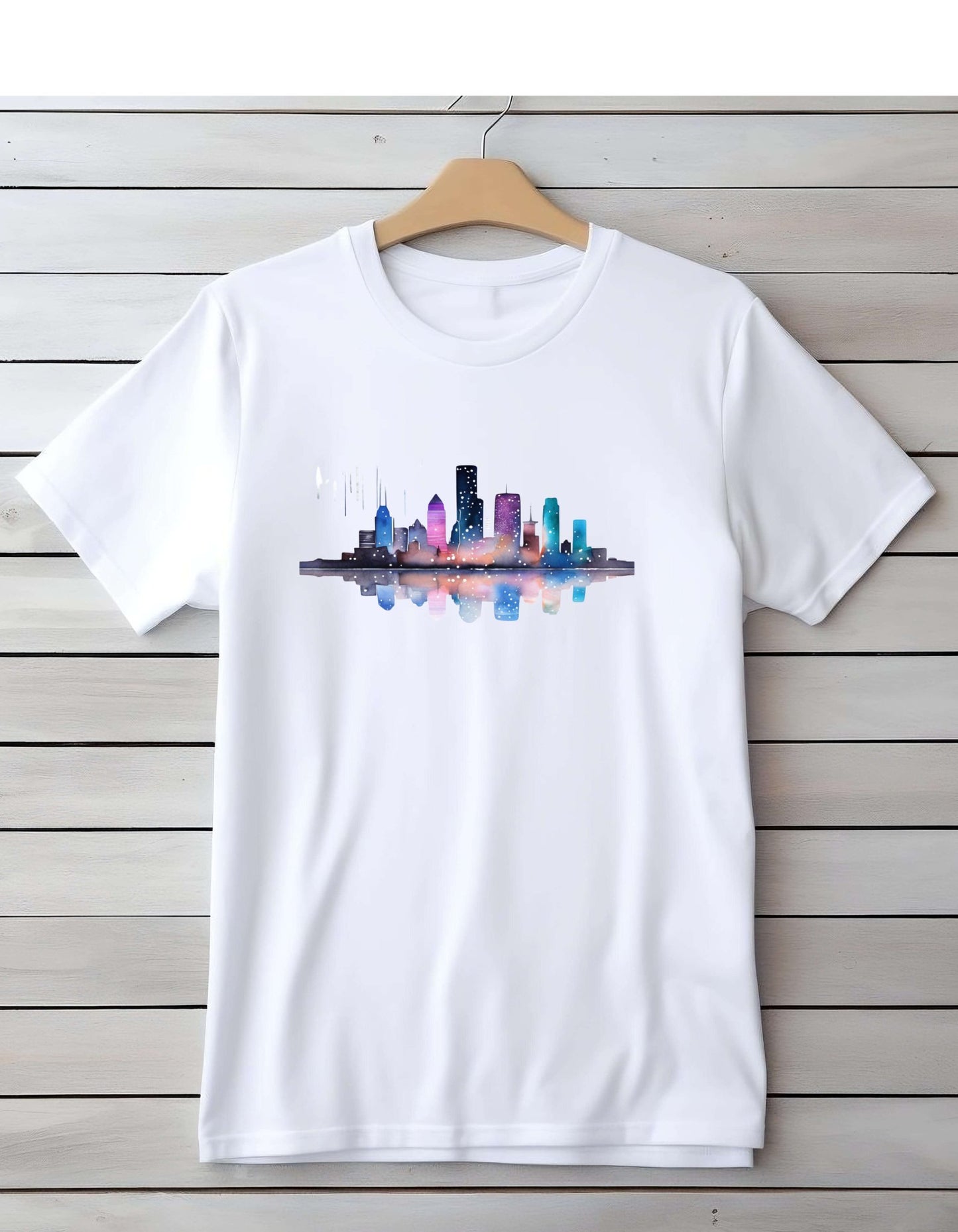 White short sleeve t-shirt with the graphic of the skyline of downtown Houston. The graphic is painted in water color style.