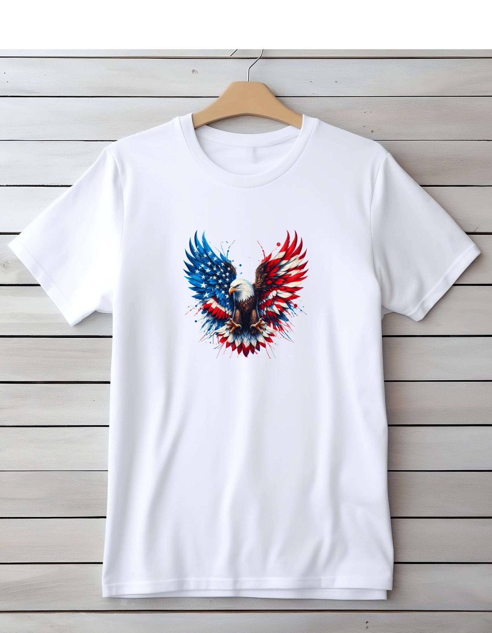 White short sleeve shirt with a graphic of an bald eagle with its wings spread in flight. The wings have the colors of the American flag on them.